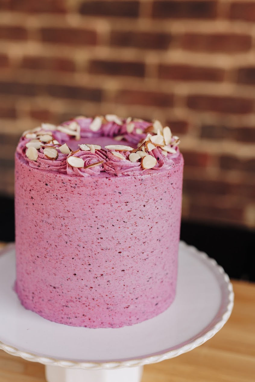 Gluten-free Almond Cake with Mixed Berry Icing