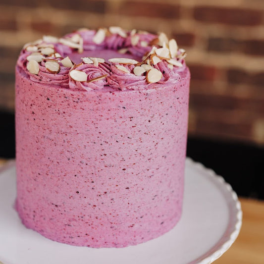 Gluten-free Almond Cake with Mixed Berry Icing